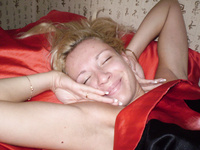 Playful blonde takes naughty pictures