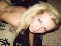 Playful blonde takes naughty pictures